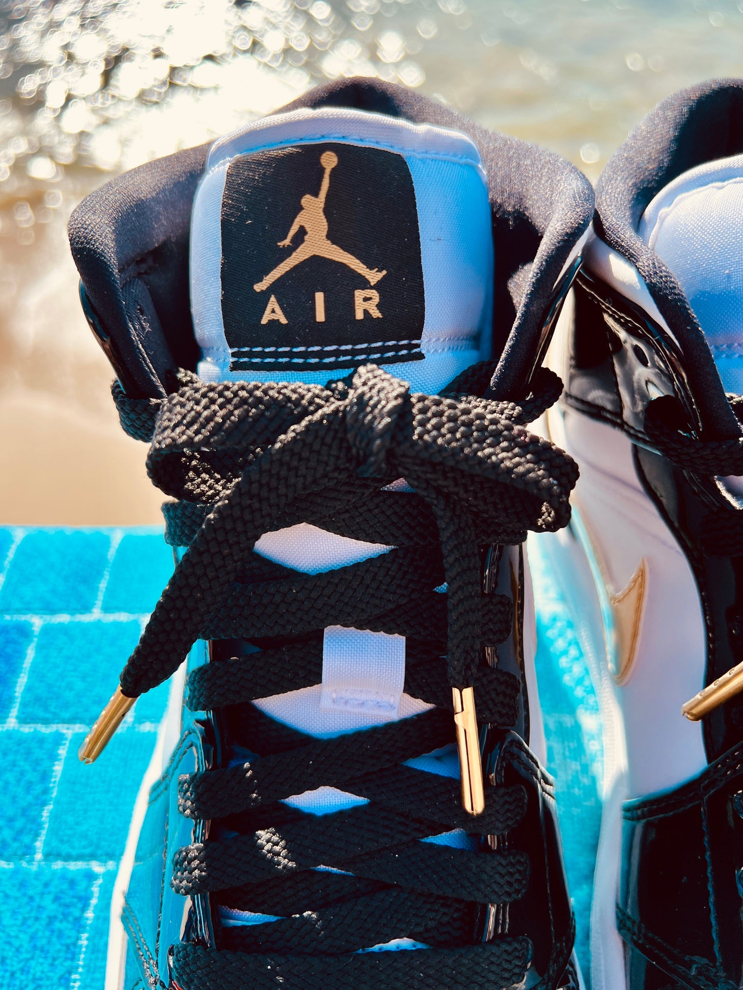 2023 Jordan 1 Mid Patent Black Tie (852542-007)
